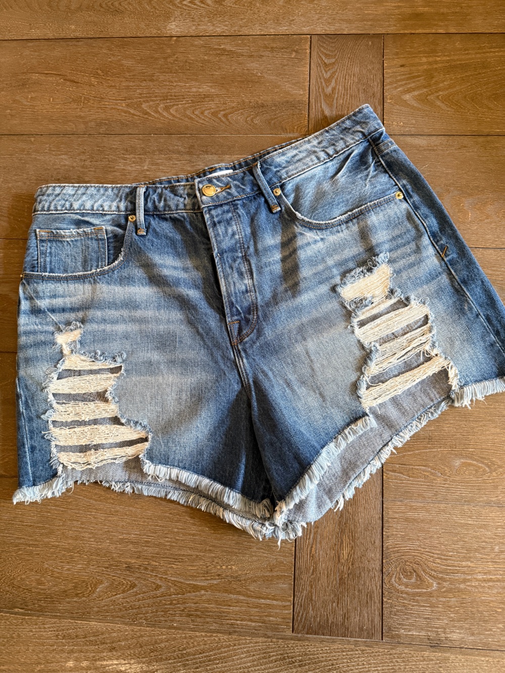 Good American Heavily Distressed Denim Cutoff Shorts